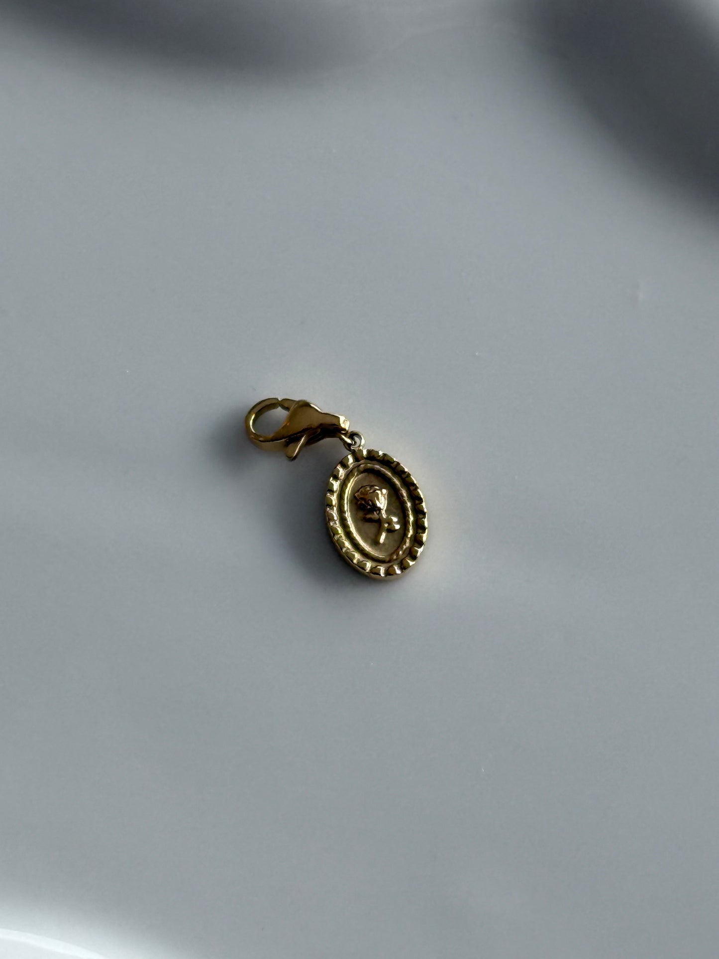 Charms rose encadrée